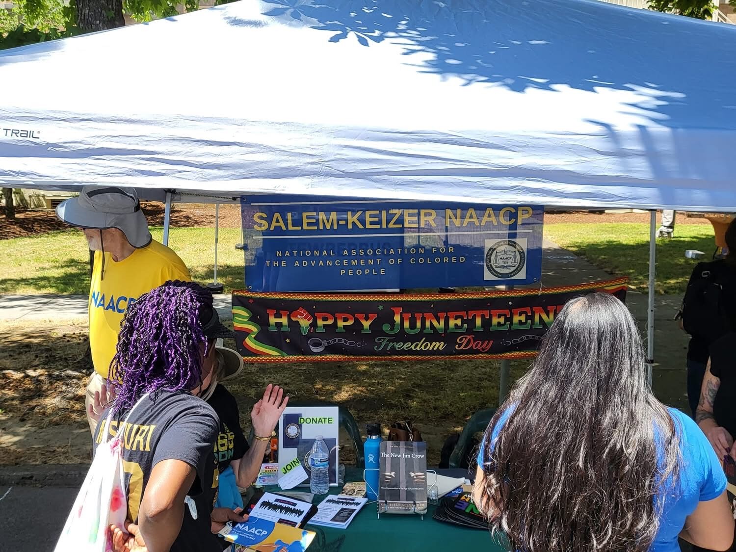 Salem-Keizer NAACP table at a Juneteenth community event