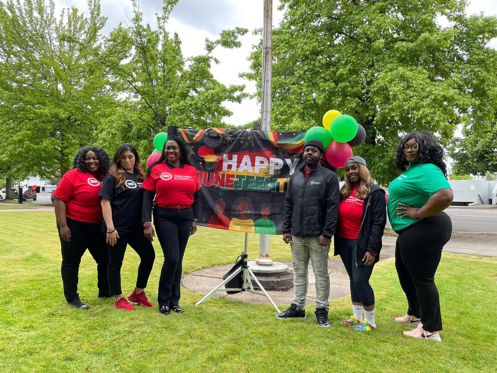 Volunteers and partner organizations at a Juneteenth block party